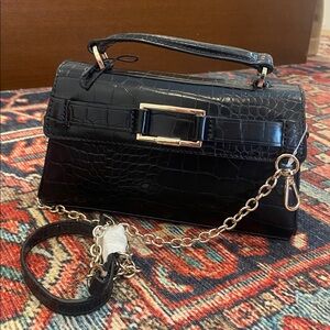 Zara New cross body woman bag.
Elegant Black Crocodile-Embossed Handbag